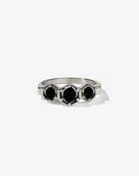 Meadowlark Jewellery’s classic 3 Hexagon Stone Engagement Ring in 18ct White Gold, claw set with 0.95ct round brilliant cut black diamonds. A bold and beloved 3 stone ring, this Ceremonial design is made to order in New Zealand.