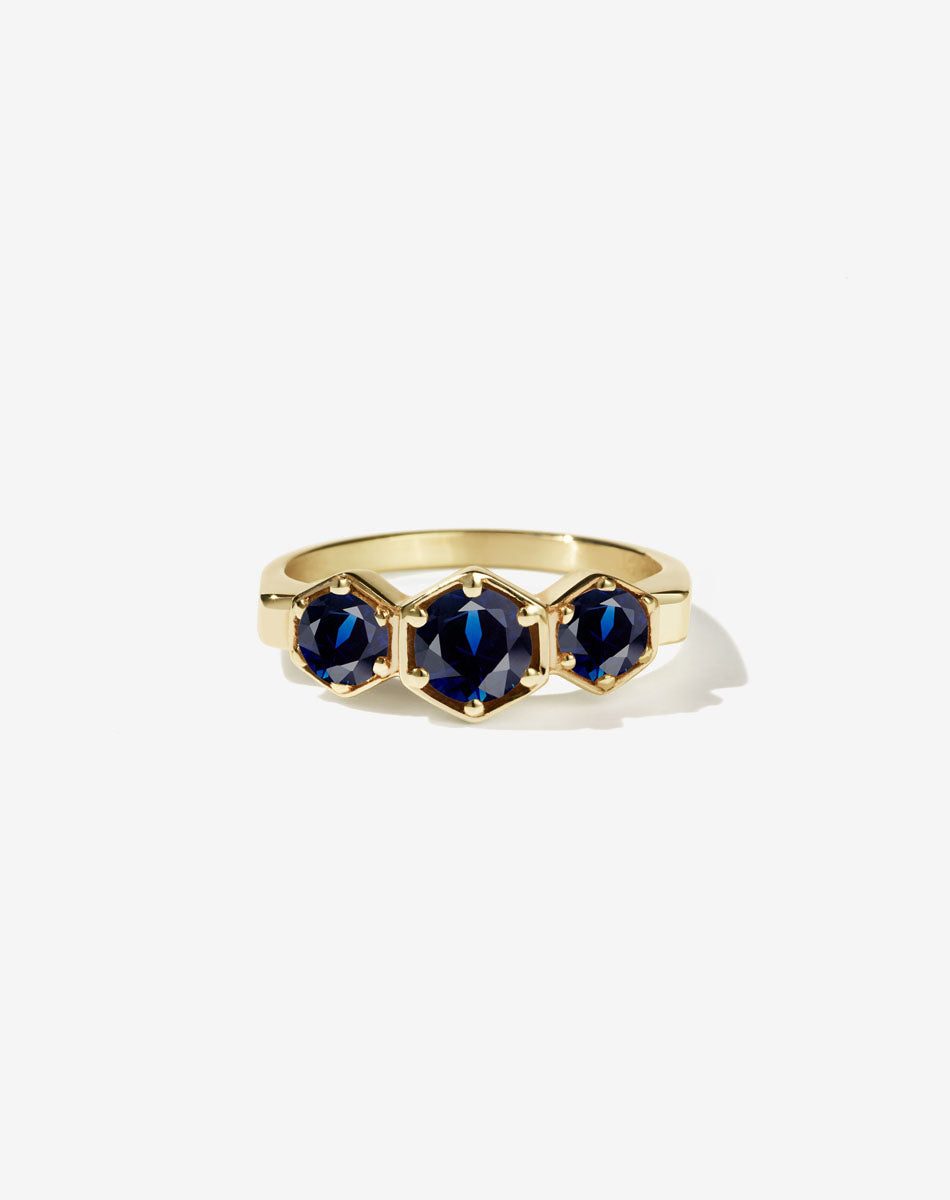 Meadowlark Jewellery’s classic 3 Hexagon Stone Engagement Ring in 18ct Yellow Gold, claw set with round brilliant cut blue sapphires. Fully traceable and ethically sourced blue and green sapphires from Queensland, Australia. A bold and beloved 3 stone ring, this Ceremonial design is made to order in New Zealand. 