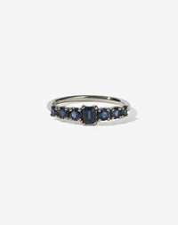 Meadowlark Jewellery’s beautiful Amelie Engagement Ring in 18ct White Gold, claw set with emerald cut and round brilliant cut blue sapphires atop a fine round band. Fully traceable and ethically sourced blue and green sapphires from Queensland, Australia. A low set, petite seven stone engagement ring this Ceremonial design made to order in New Zealand.