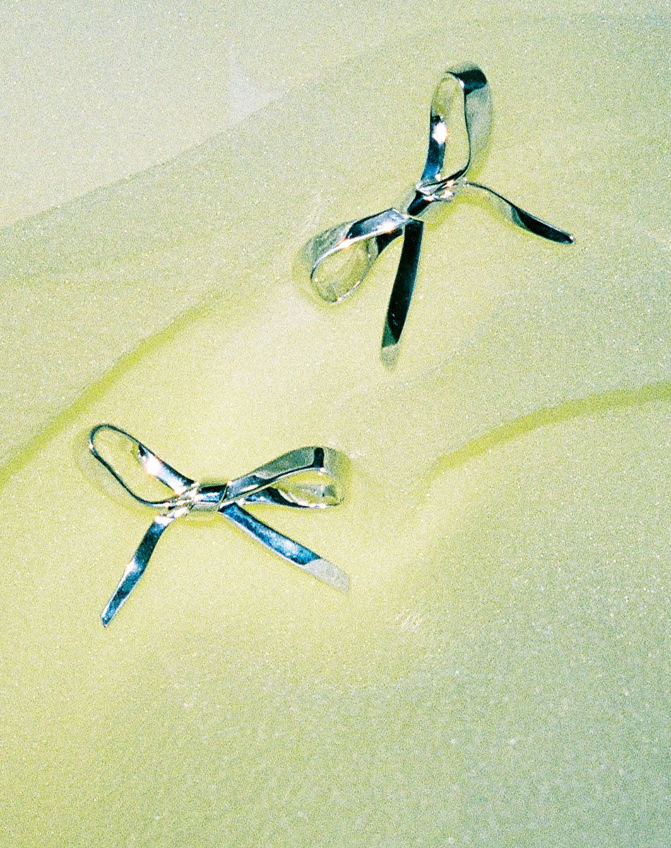 Large Silver Bow Statement Earrings