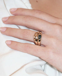 Claude Platinum Ring with oval green sapphire swiss set, worn on hand, stacked with matching Claude band.