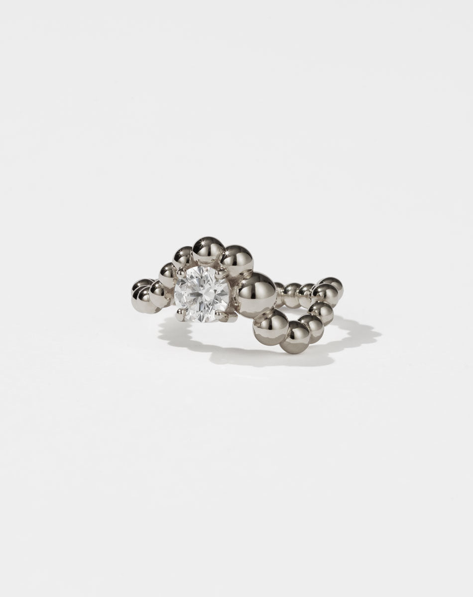 Meadowlark Jewellery’s unique Fizzy Ring Petite Solitaire Engagement Ring in 18ct White Gold, with 0.84ct round brilliant cut white diamond. An alternative Ceremonial design to celebrate love, made to order in New Zealand.