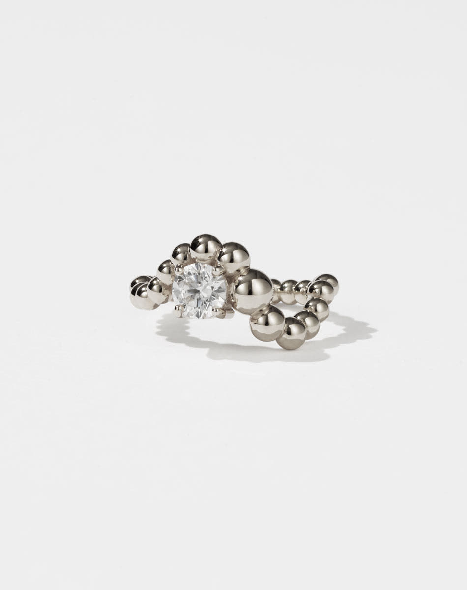 Meadowlark Jewellery’s unique Fizzy Ring Petite Solitaire Engagement Ring in 9ct White Gold, with 0.84ct round brilliant cut white diamond. An alternative Ceremonial design to celebrate love, made to order in New Zealand.