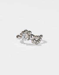 Meadowlark Jewellery’s unique Fizzy Ring Petite Solitaire Engagement Ring in Platinum, with 0.84ct round brilliant cut white diamond. An alternative Ceremonial design to celebrate love, made to order in New Zealand.