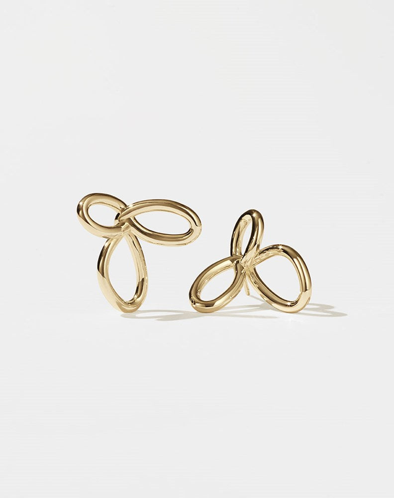 Gold flower earrings in a modern looped style