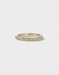 A square-shaped, chunky wedding band in 9ct yellow gold, set with small round brilliant diamonds.