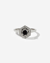 Meadowlark Jewellery’s iconic Hex Engagement Ring 0.5ct in 14ct White Gold, claw set with 0.61ct round brilliant cut black diamond centre stone, surrounded by a hexagon halo of pave set white diamonds. One of our most beloved and modern Ceremonial designs, made to order in New Zealand. Pair with our bestseller, the Diamond Eternity Band.