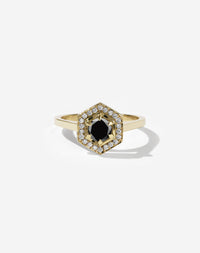 Meadowlark Jewellery’s iconic Hex Engagement Ring 0.5ct in 14ct Yellow Gold, claw set with 0.61ct round brilliant cut black diamond centre stone, surrounded by a hexagon halo of pave set white diamonds. One of our most beloved and modern Ceremonial designs, made to order in New Zealand. Pair with our bestseller, the Diamond Eternity Band.