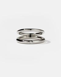 Coco Ring with double bands in Sterling Silver. Set with round brilliant white diamond. 2.3mm and 2.8mm wide bands.