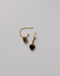 Gold hoop earrings with red heart garnet gemstone charms