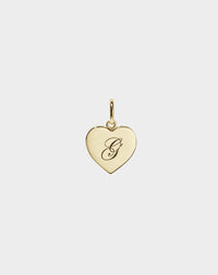 A 9ct solid gold heart-shaped charm with an engraved letter 'G' on it.