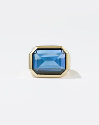 Meadowlark Jewellery's bold Limited Edition Milan Cocktail Ring in 9ct Yellow Gold, bezel set with an emerald-cut blue topaz stone. A classic and timeless design, to celebrate milestones or bring decadence to everyday. Made to order in New Zealand, at the Meadowlark workshop. A bolder version of our Milan Ring.