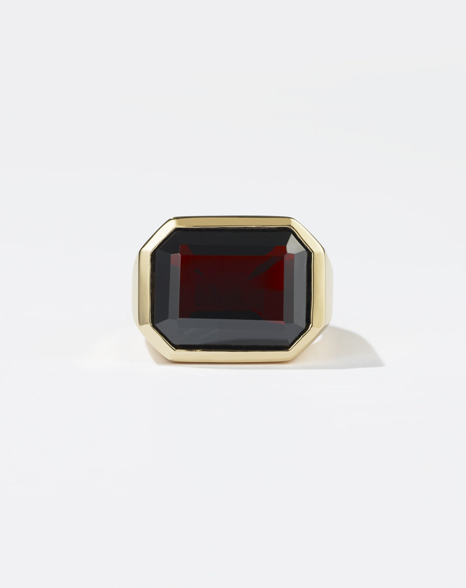 Meadowlark Jewellery's bold Limited Edition Milan Cocktail Ring in 9ct Yellow Gold, bezel set with an emerald-cut thai garnet stone. A classic and timeless design, to celebrate milestones or bring decadence to everyday. Made to order in New Zealand, at the Meadowlark workshop. A bolder version of our Milan Ring.