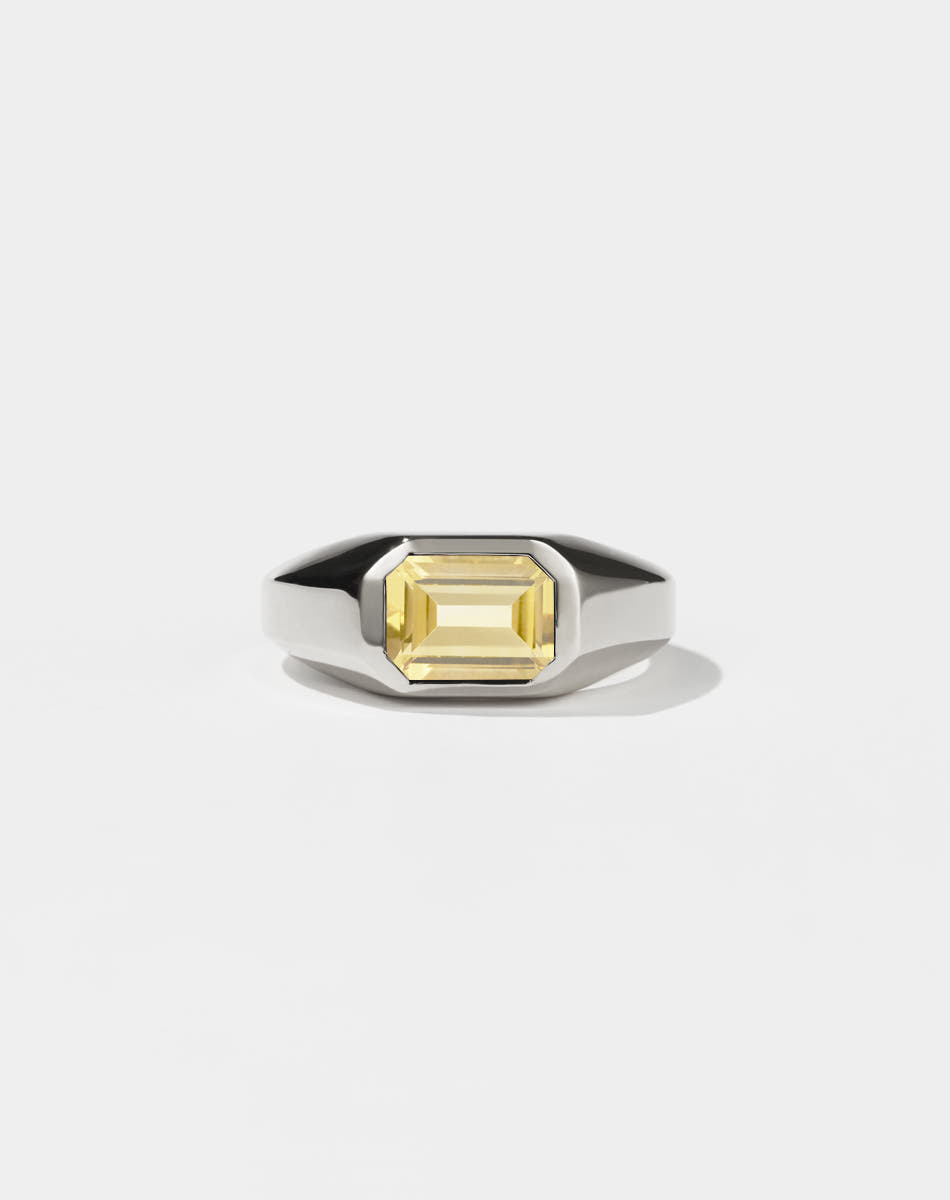 A sterling silver ring with a Citrine gem on a white background. Made by Meadowlark Jewellery in New Zealand.