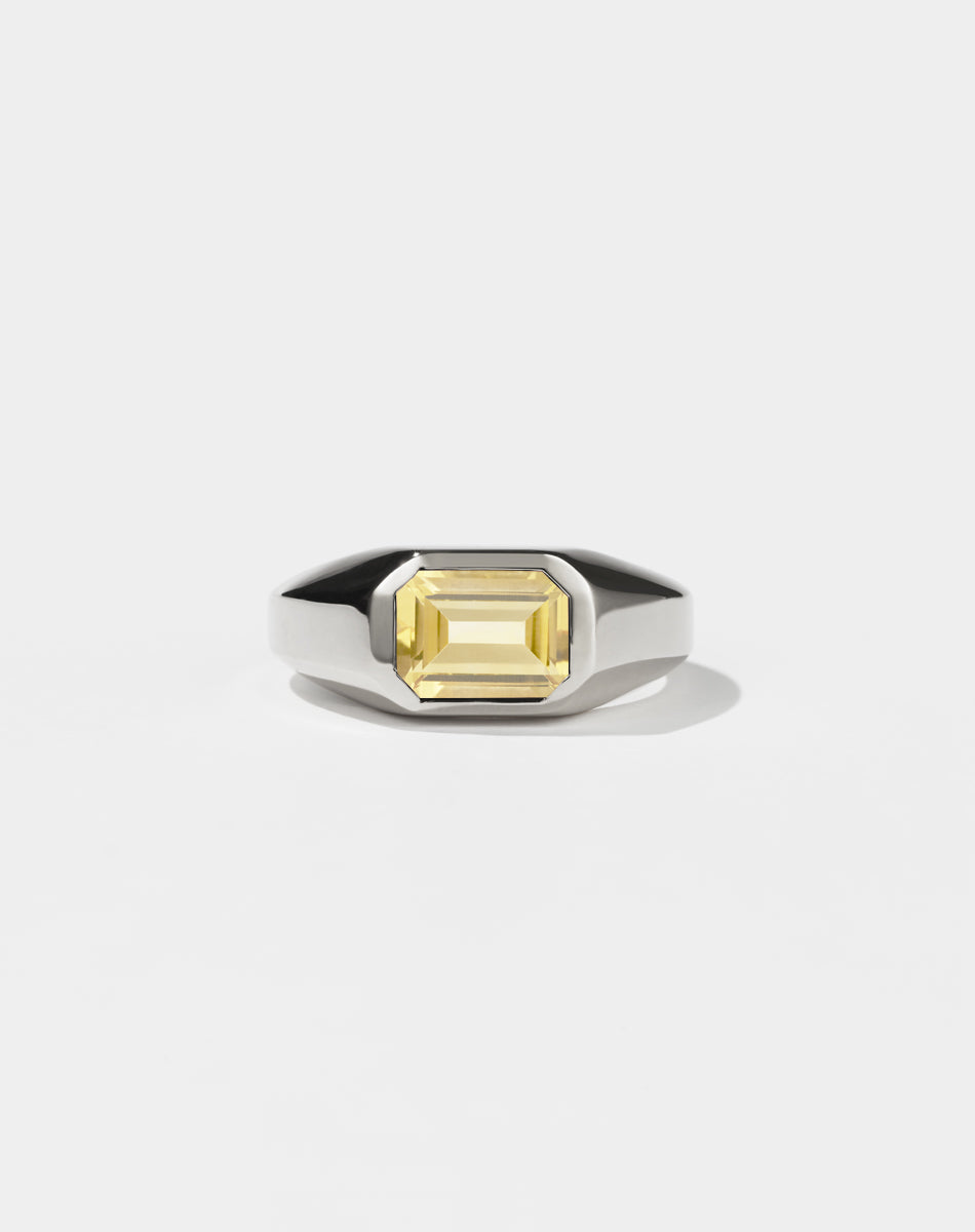 A sterling silver ring with a Citrine gem on a white background. Made by Meadowlark Jewellery in New Zealand.