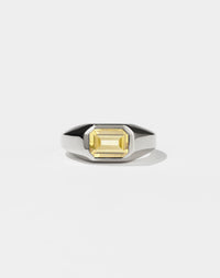 A sterling silver ring with a Citrine gem on a white background. Made by Meadowlark Jewellery in New Zealand.