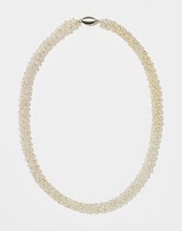 Pearl necklace on a white background