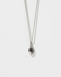 Necklace with a tulip bud charm pendant on a white background
