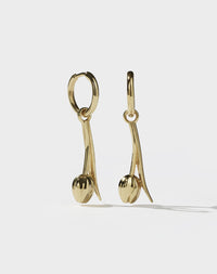 Gold Tulip motif earrings on a white background