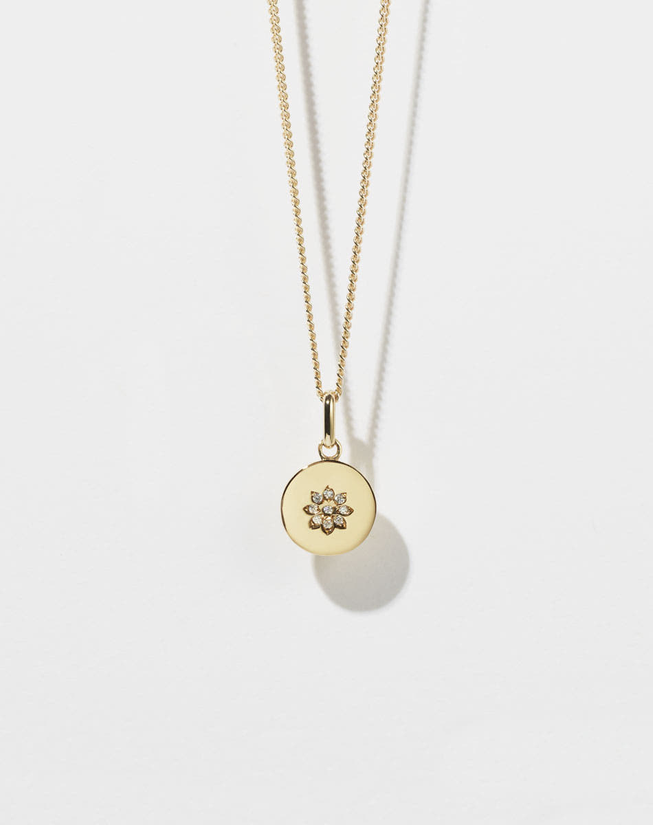 Violet Necklace with floral engraving in 9ct Yellow Gold. Set with White Diamond. 11m diameter pendant. 40cm or 45cm diamond curb chain.