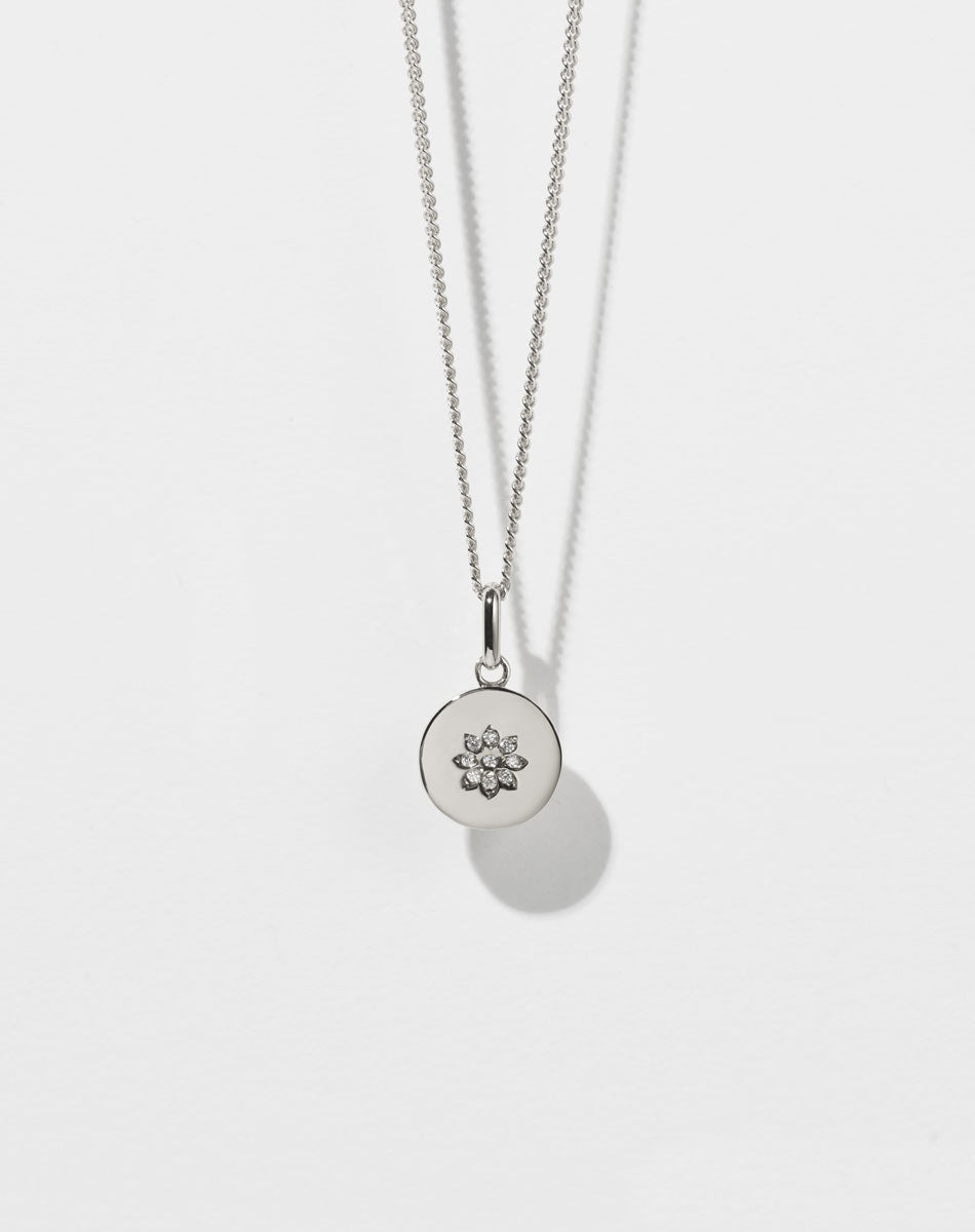 Violet Necklace with floral engraving in Sterling Silver. Set with White Diamond. 11m diameter pendant. 40cm or 45cm diamond curb chain.