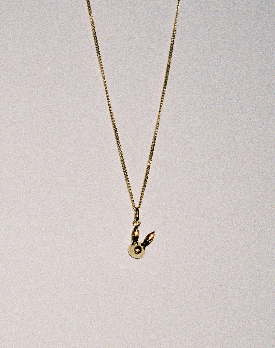 Gold bunny rabbit charm necklace on fine chain