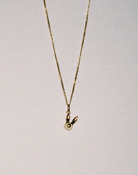 Gold bunny rabbit charm necklace on fine chain