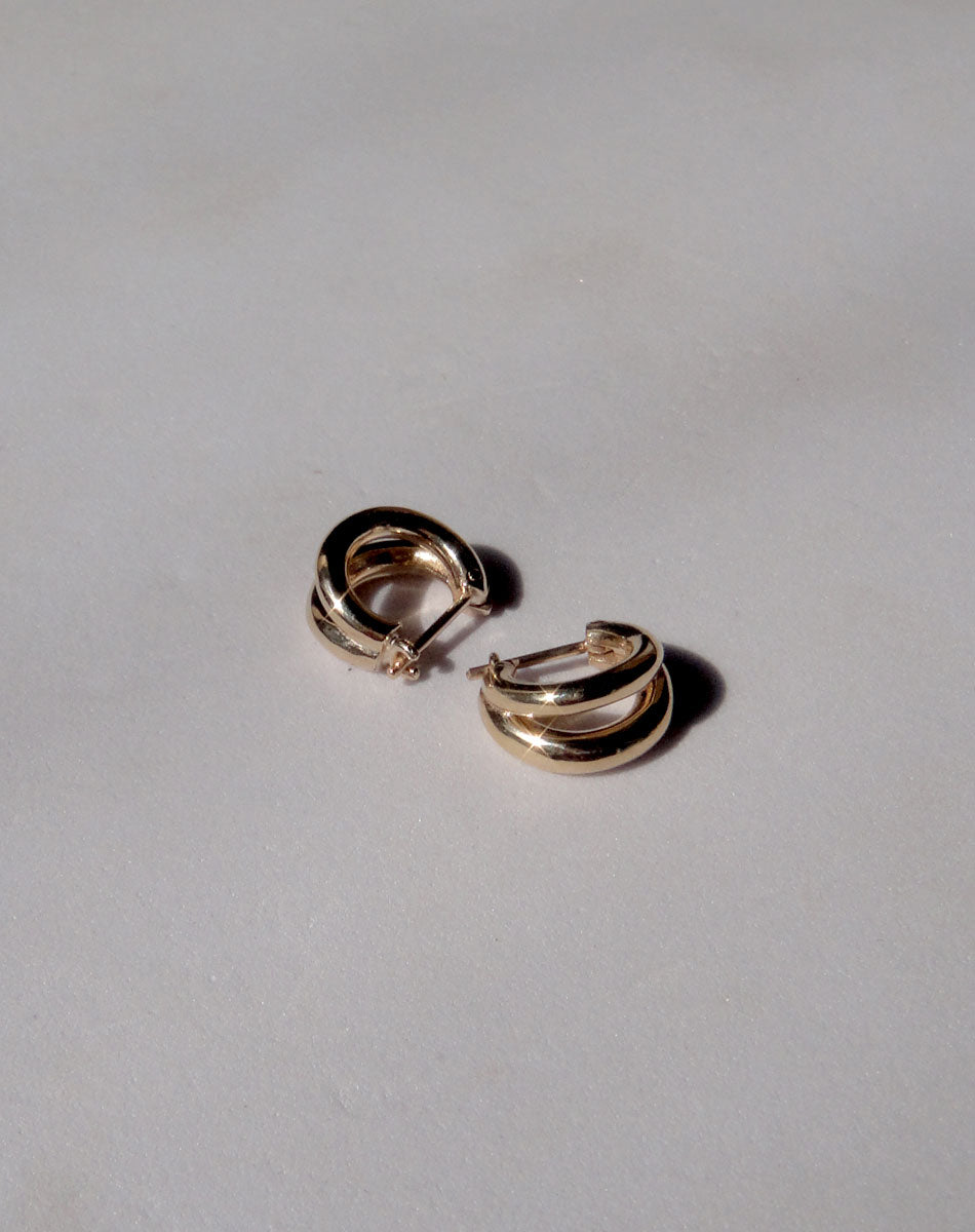 Coco Hoops Small Earrings in 23k Gold Plated or 9ct Yellow Gold, featuring a double hoop and lever or clicker back earring closure. Inner diameter approximately 7.5mm.