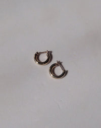 Halo Huggies Earrings in 23k Gold Plated or 9ct Yellow Gold with lever or clicker back earring closure. Inner diameter approximately 7mm.