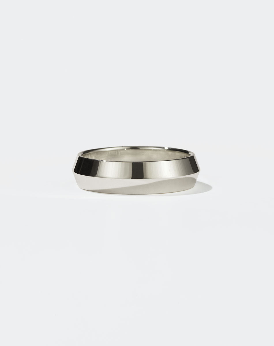 Meadowlark Jewellery's classic 6mm wide Knife Edge Band in 14ct White Gold. Designed for everyday or as a men's wedding band. Made to order in Auckland, New Zealand. 