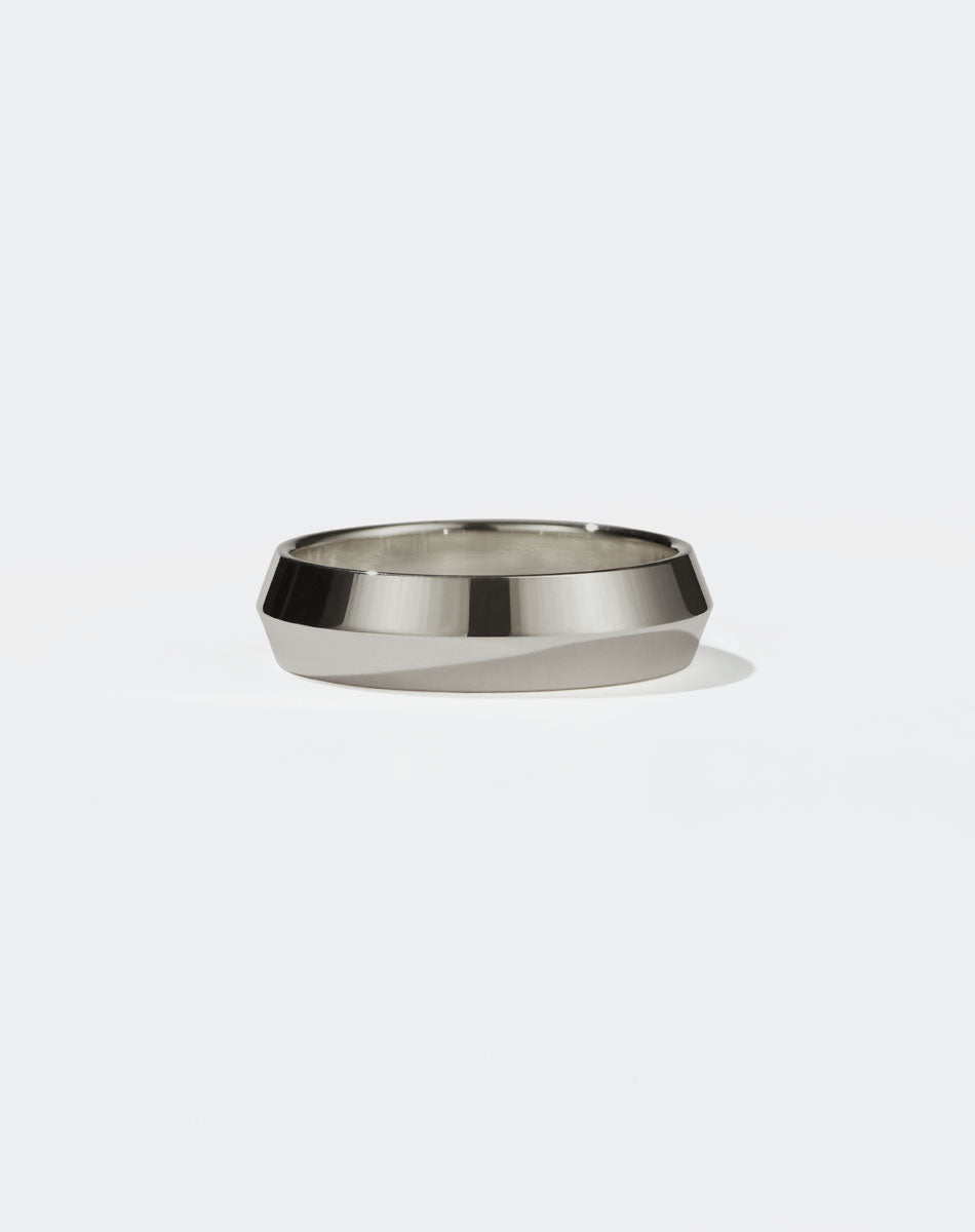 Meadowlark Jewellery's classic 6mm wide Knife Edge Band in 18ct White Gold. Designed for everyday or as a men's wedding band. Made to order in Auckland, New Zealand. 