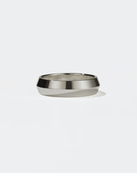 Meadowlark Jewellery's classic 6mm wide Knife Edge Band in 18ct White Gold. Designed for everyday or as a men's wedding band. Made to order in Auckland, New Zealand. 