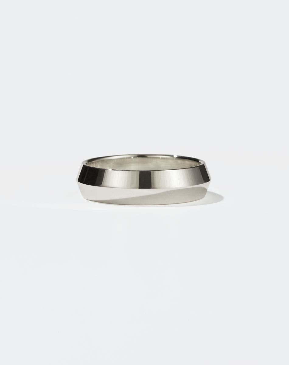Meadowlark Jewellery's classic 6mm wide Knife Edge Band in 9ct White Gold. Designed for everyday or as a men's wedding band. Made to order in Auckland, New Zealand. 