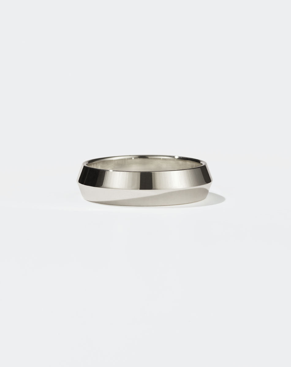 Meadowlark Jewellery's classic 6mm wide Knife Edge Band in 9ct White Gold. Designed for everyday or as a men's wedding band. Made to order in Auckland, New Zealand. 
