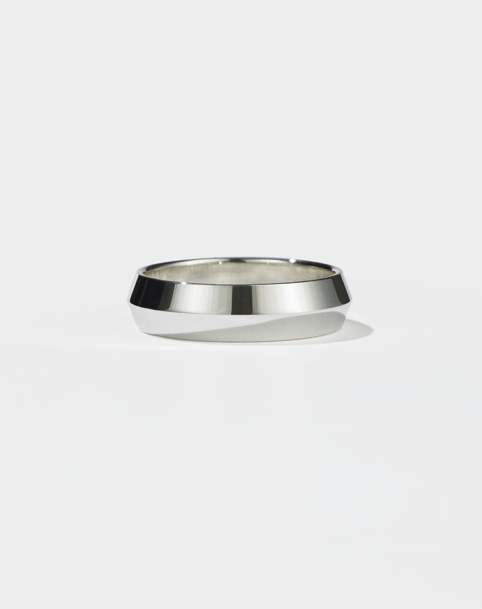 Meadowlark Jewellery's classic 6mm wide Knife Edge Band in Sterling Silver. Designed for everyday or as a men's wedding band. Made to order in Auckland, New Zealand. 
