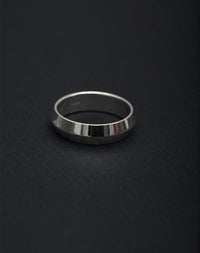 Meadowlark Jewellery's classic 6mm wide Knife Edge Band in Sterling Silver. Designed for everyday or as a men's wedding band. Made to order in Auckland, New Zealand. 