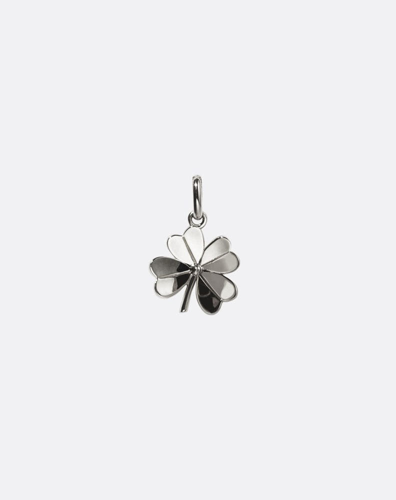 Silver four-leaf clover pendant on a white background