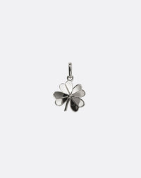 Silver four-leaf clover pendant on a white background
