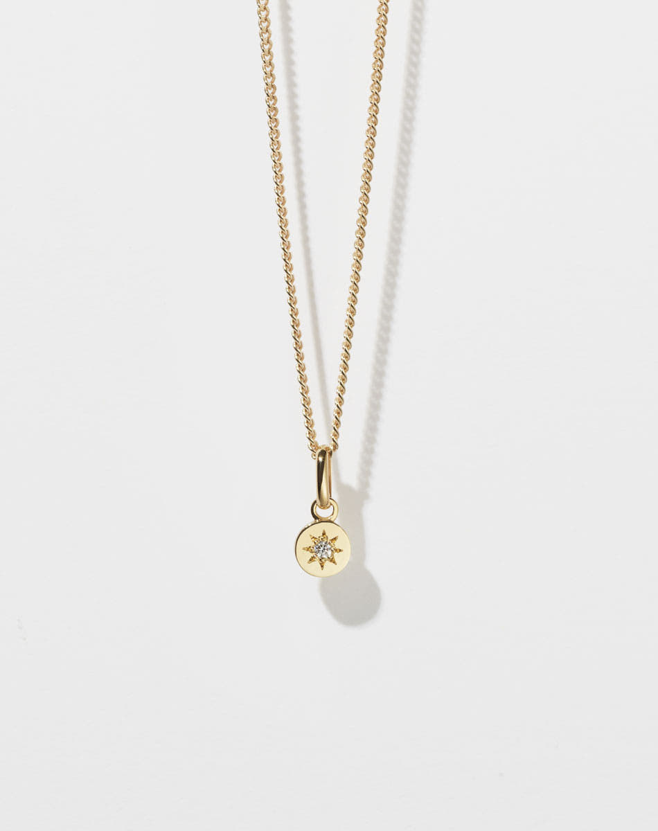 Meadowlark Jewellery's Lulu Necklace in 23k Gold Plated or 9ct Yellow with star set White Diamond. 6mm diameter pendant on 40cm or 45cm diamond curb chain.
