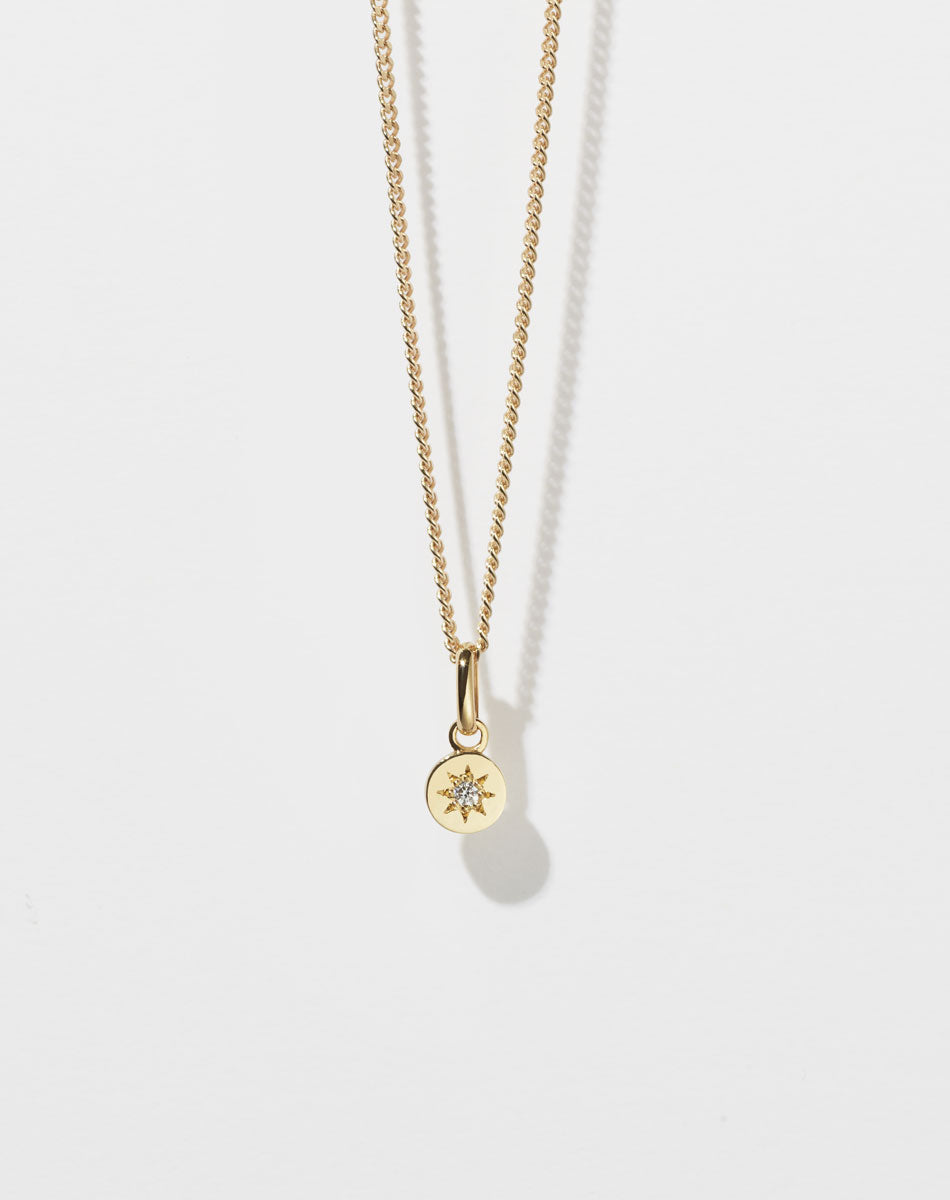 Meadowlark Jewellery's Lulu Necklace in 23k Gold Plated or 9ct Yellow with star set White Diamond. 6mm diameter pendant on 40cm or 45cm diamond curb chain.