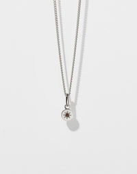 Lulu Necklace in Sterling Silver with star set African Garnet. 6mm diameter pendant on 40cm or 45cm diamond curb chain.