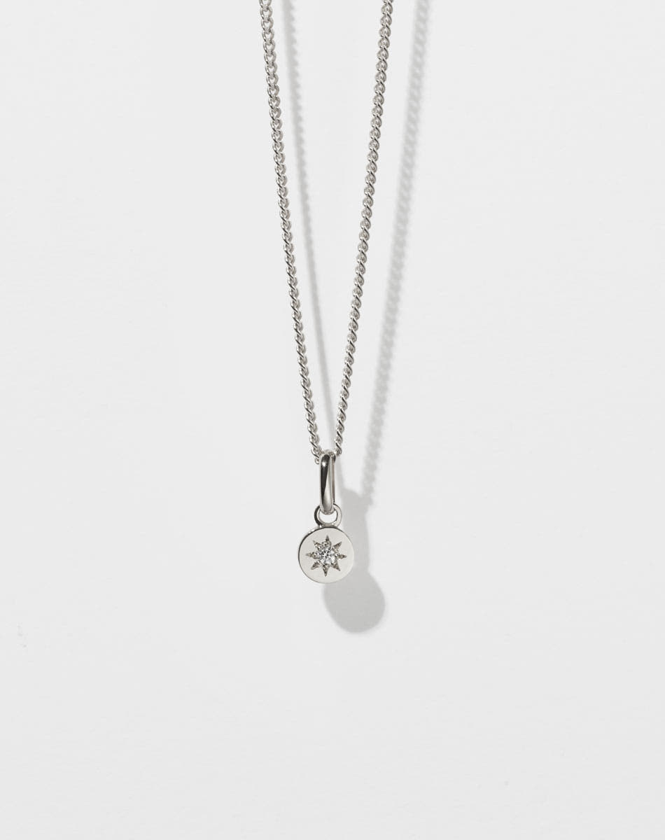 Lulu Necklace in Sterling Silver with star set White Diamond. 6mm diameter pendant on 40cm or 45cm diamond curb chain.