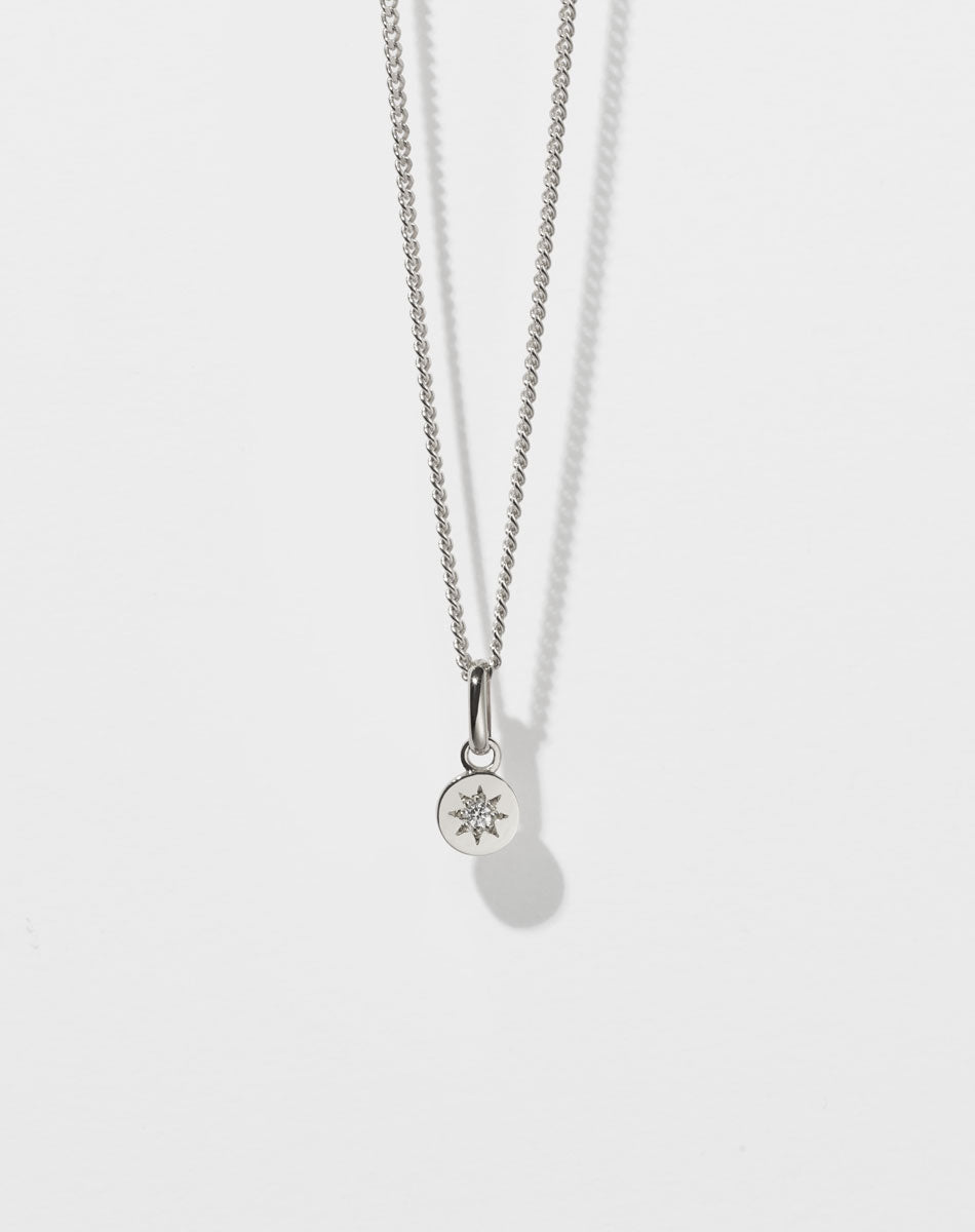 Lulu Necklace in Sterling Silver with star set White Diamond. 6mm diameter pendant on 40cm or 45cm diamond curb chain.