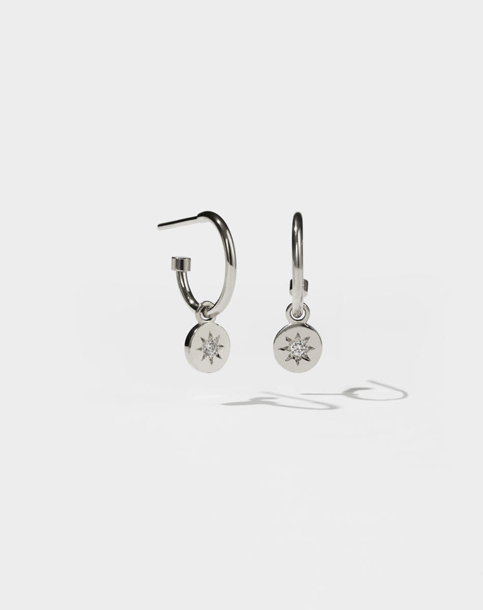 Lulu Signature Hoop Earrings in Sterling Silver with star set White Diamond. 6mm in diameter.