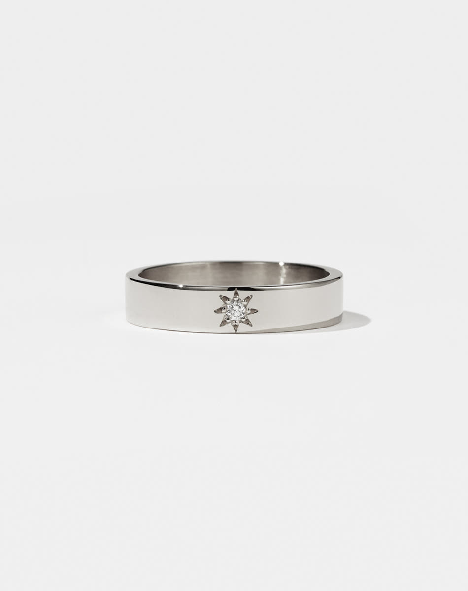 Lulu Star Band in Sterling Silver with star set round brilliant cut White Diamond. 4.5mm width wedding band.