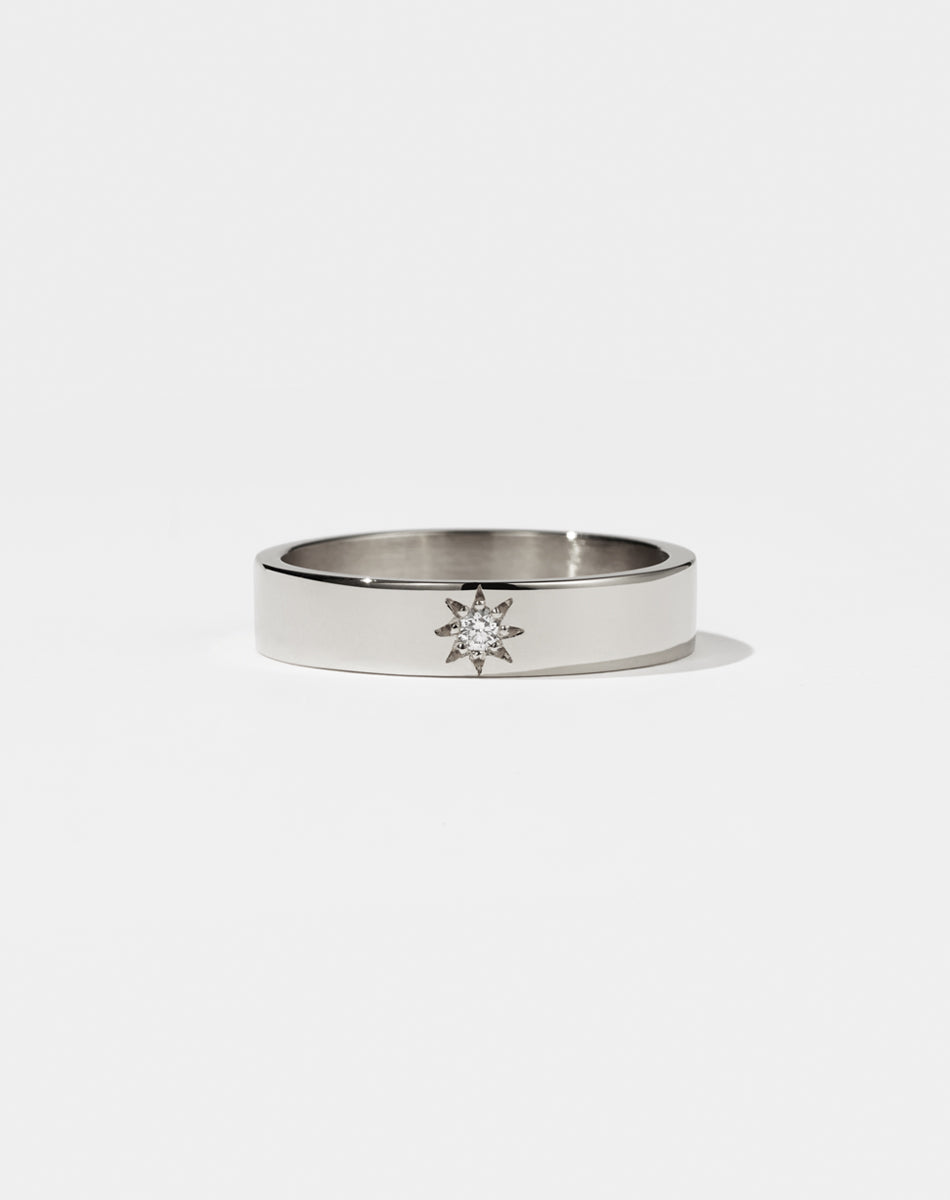 Lulu Star Band in Sterling Silver with star set round brilliant cut White Diamond. 4.5mm width wedding band.