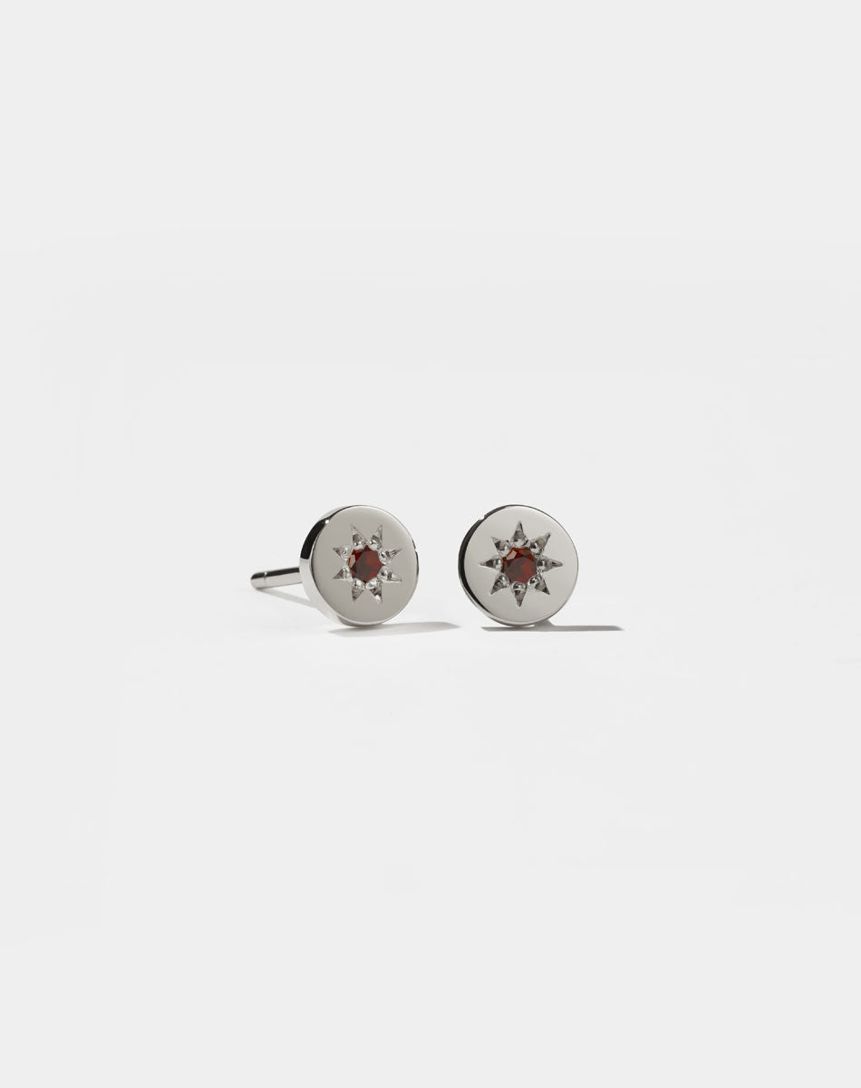 Lulu Stud Earrings in Sterling Silver with star set African Garnet. 6mm in diameter.