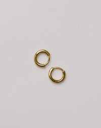 Pair of gold hoop huggie earrings 