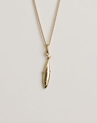Gold necklace with a sardine pendant 