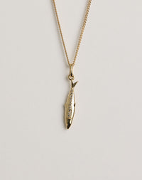 Gold necklace with a sardine pendant set with diamonds 